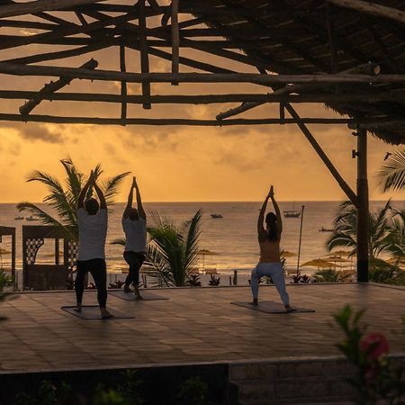 Готель The Mora Zanzibar Матемве Екстер'єр фото Sunset yoga at the beach