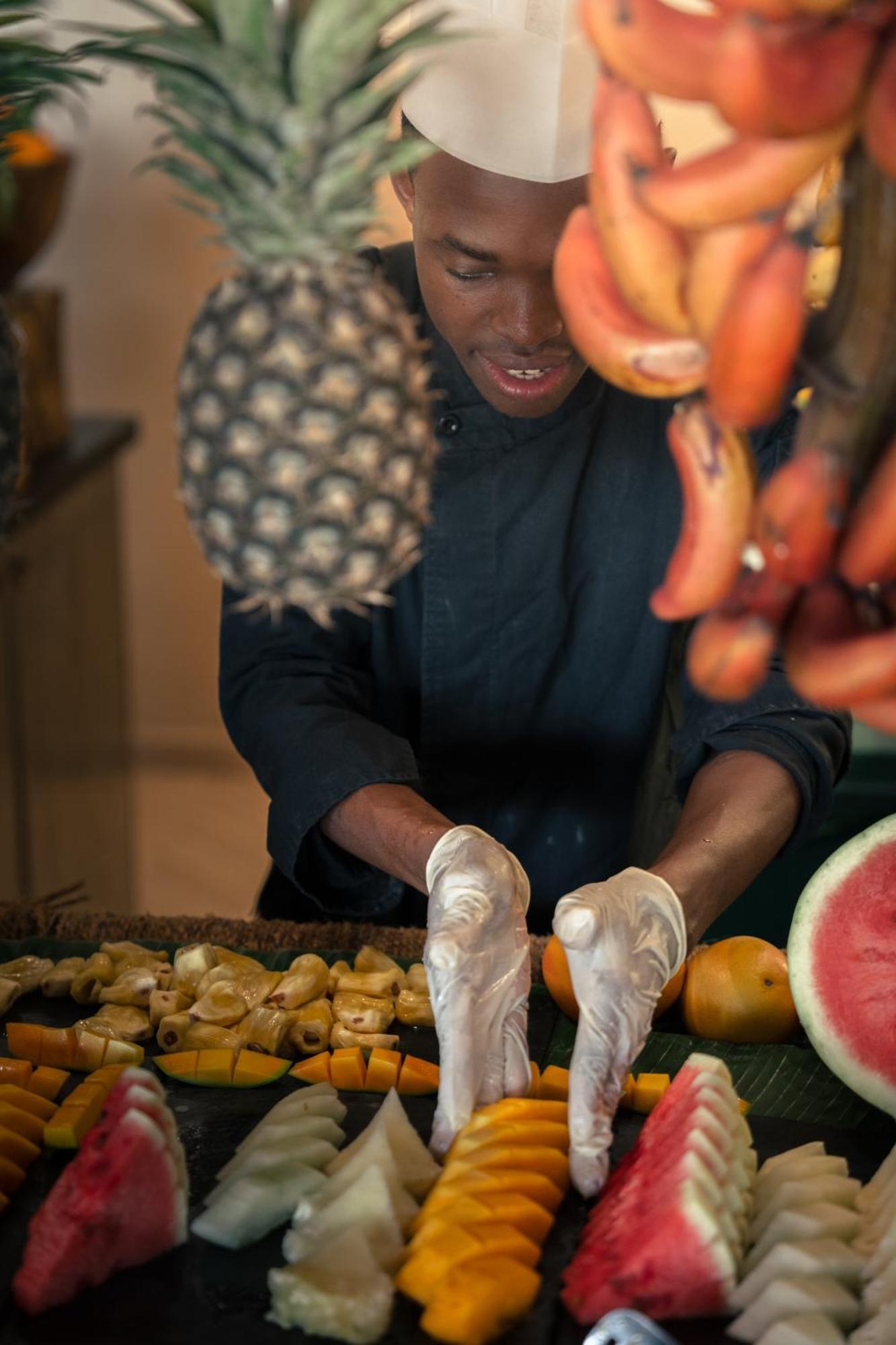 Готель The Mora Zanzibar Матемве Екстер'єр фото A chef preparing fruit